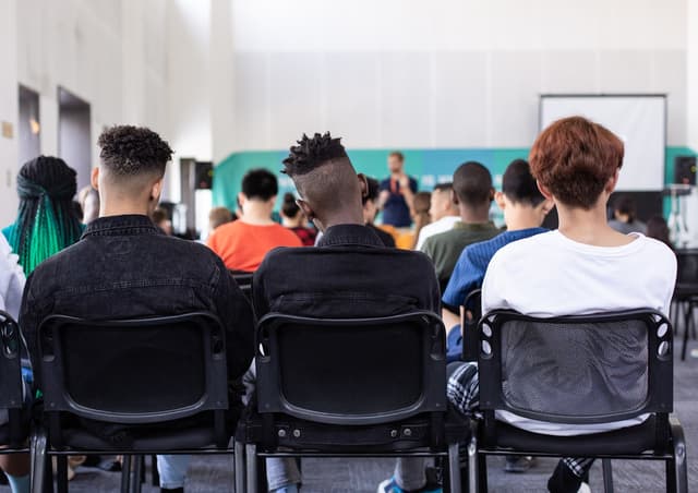 People seated in a training session